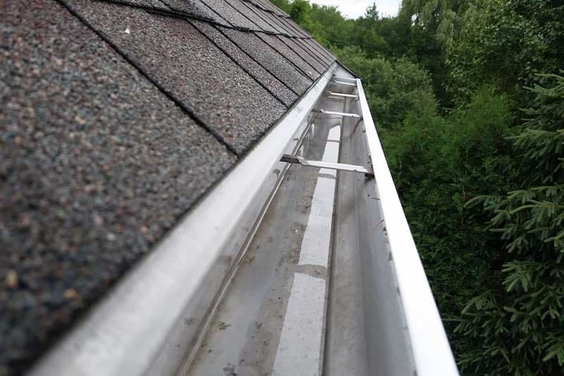 Close-up view of a residential gutter during gutter cleaning service