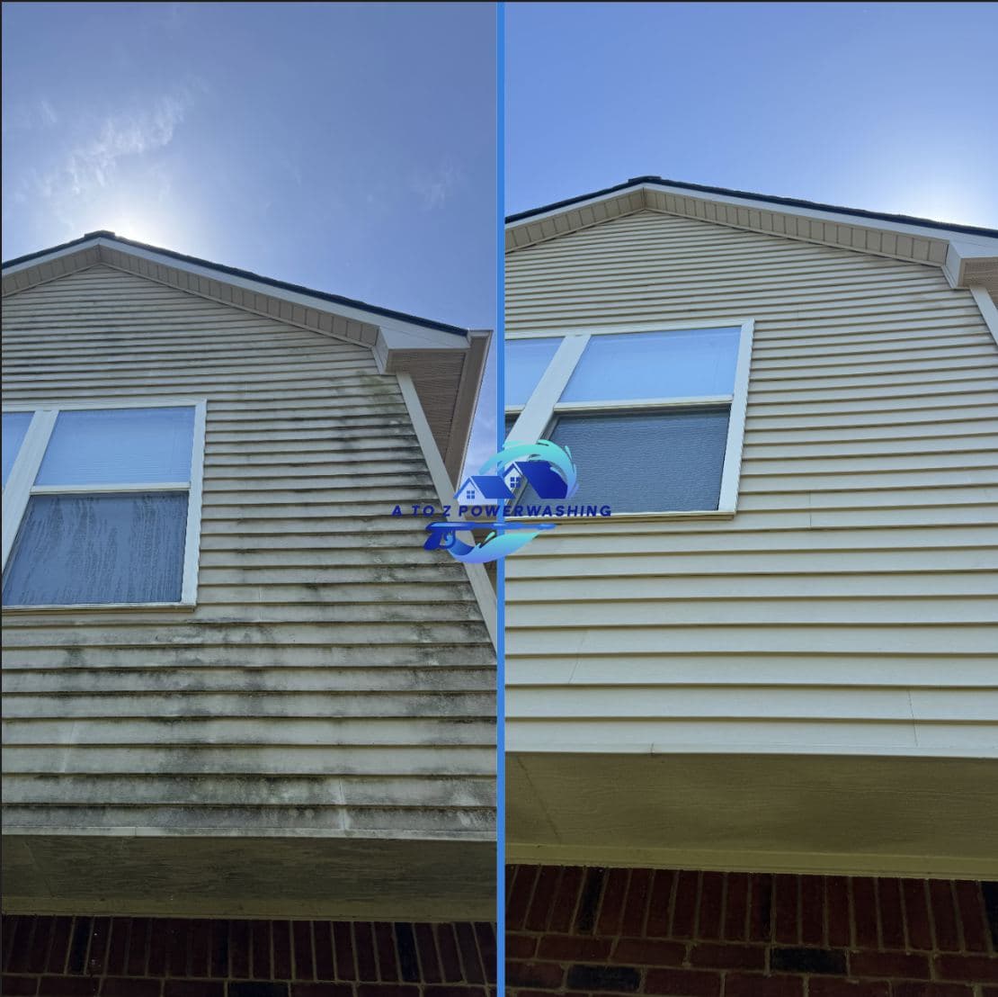 Before and after house wash on a vinyl gable with heavy algae