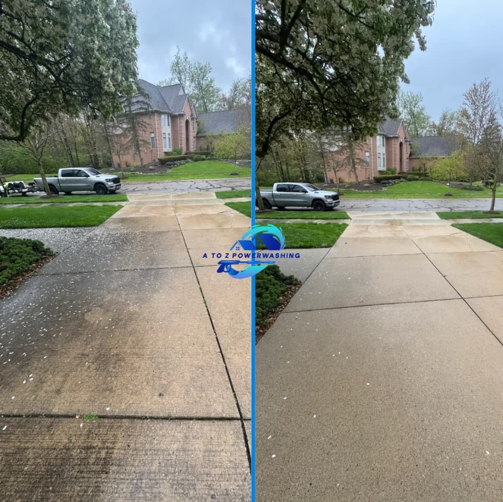 before and after driveway concrete cleaning in West Bloomfield Michigan stained driveway restored in front of brick home by A to Z Power Washing — also serving Oakland County, MI