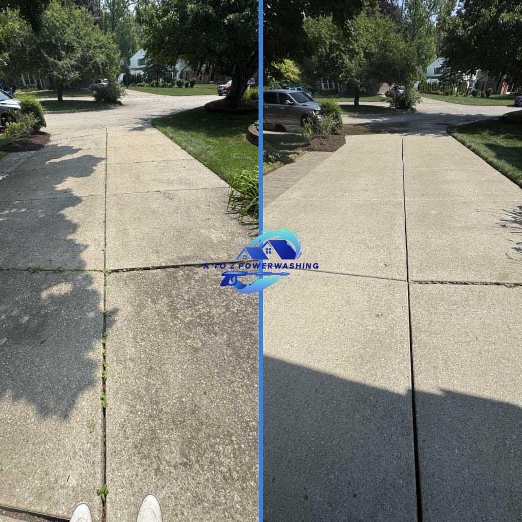 Before and after cleaning of a wide concrete driveway